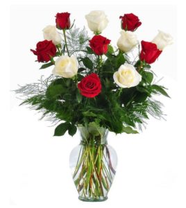 One dozen of the finest Ecuadorian roses carefully hand selected and arranged in their natural beauty --this bouquet comes in a quality glass vase. Six each of red and whtie.