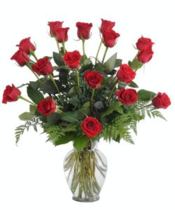 One dozen of the worlds finest Ecuadorian roses carefully hand selected and arranged in all their natural beauty in a glass vase