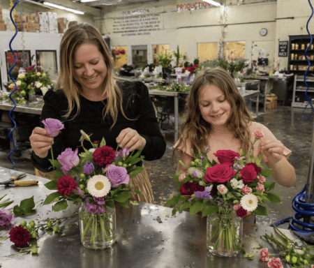 Mom and daughter designing flowers
